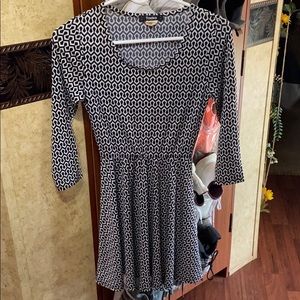 I am selling a black and white long sleeve dress.